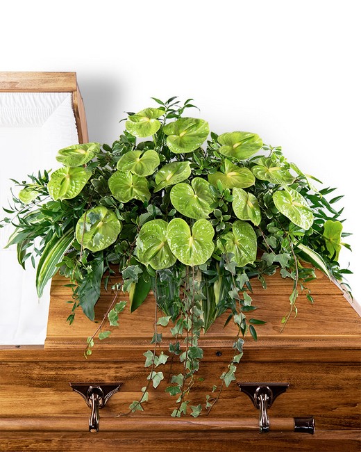 Tropical Haven Casket Spray from Sunrise Floral in O'Neill, Nebraska